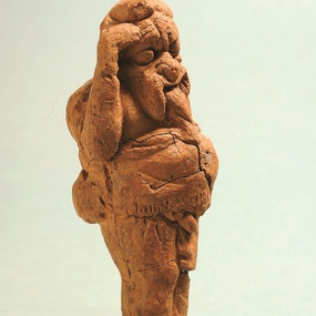 Terracotta figurine of an artist wearing a mask. Pierides Museum, Larnaka, inv. no. CL-195 (courtesy of the Pierides Museum).