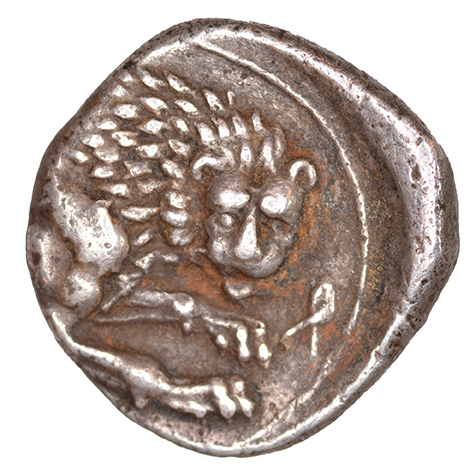 Οπισθότυπος 'SilCoinCy A1041, acc.no.: RP 400.114. Silver coin of king Wroikos of Amathous 350 ? BC - . Weight: 2.14 g, Axis: 12h, Diameter: 14mm. Obverse type: Lion’s head r.. Obverse symbol: -. Obverse legend: - in -. Reverse type: Lion forepart r. with facing head. Reverse symbol: -. Reverse legend: ro in Cypriot syllabic. '-', 'Du classement des séries chypriotes'.