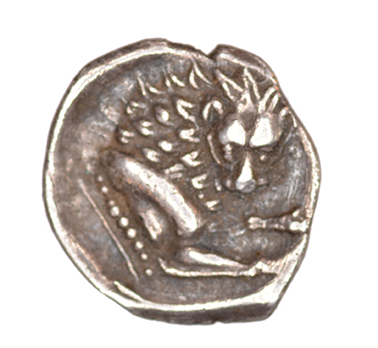 Οπισθότυπος 'SilCoinCy A1042, acc.no.: KP 313.5. Silver coin of king Wroikos of Amathous 350 ? BC - . Weight: 0.54 g, Axis: 9h, Diameter: 11mm. Obverse type: Lion’s head r.. Obverse symbol: -. Obverse legend: - in -. Reverse type: Lion forepart r. with facing head. Reverse symbol: -. Reverse legend: - in -. '-', 'Du classement des séries chypriotes'.
