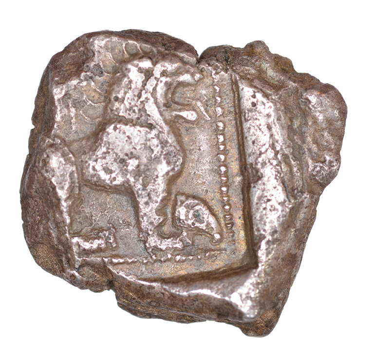 Οπισθότυπος 'SilCoinCy A1044, acc.no.: KP 1512.9. Silver coin of king Baalmilk I of Kition 475 - 450 BC. Weight: 0.79 g, Axis: 6h, Diameter: 23mm. Obverse type: Heracles advancing r. holding club and bow. Obverse symbol: -. Obverse legend: - in -. Reverse type: Lion seated r., ram’s head on it’s feet. Reverse symbol: ram’s head. Reverse legend: - in -. '-', 'BMC Cyprus, A Catalogue of the Greek Coins in the British Museum, Cyprus'.