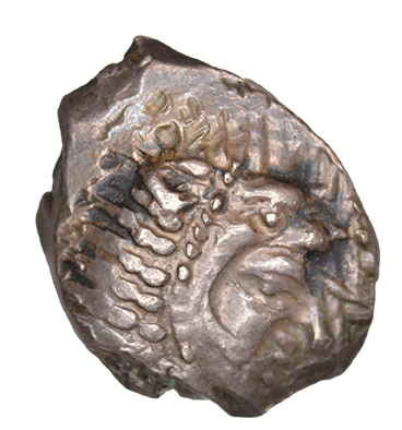 Obverse 'SilCoinCy A1045, acc.no.: RP 248.7. Silver coin of king Baalmilk I of Kition 475 - 450 BC. Weight: .87g, Axis: 7h, Diameter: 12mm. Obverse type: Heracles head r. unbearded with  lion skin headdress. Obverse symbol: -. Obverse legend: - in -. Reverse type: Lion seated r.. Reverse symbol: -. Reverse legend: bl in -. '-', 'Du classement des séries chypriotes'.