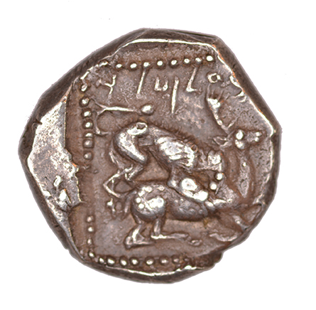 Reverse 'SilCoinCy A1051, acc.no.: KP 720.8. Silver coin of king Baalmilk II of Kition 425 - 400 BC. Weight: 1.77 g, Axis: 12h, Diameter: 12mm. Obverse type: Heracles advancing r. holding club and bow. Obverse symbol: -. Obverse legend: - in -. Reverse type: Lion devouring stag r.. Reverse symbol: -. Reverse legend: 'lmlk in Phoenician. '-', 'Du classement des séries chypriotes'.