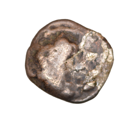 Obverse 'SilCoinCy A1054, acc.no.: KP 2063.31i. Silver coin of king Uncertain king of Kition of Kition 525 - 480 BC. Weight: 0.78 g, Axis: 10h, Diameter: 10mm. Obverse type: Heracles head r. unbearded with  lion skin headdress. Obverse symbol: -. Obverse legend: - in -. Reverse type: Lion devouring stag r.. Reverse symbol: -. Reverse legend: - in -. '-'.