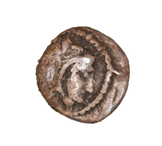 Obverse 'SilCoinCy A1056, acc.no.: KP 531.28. Silver coin of king Uncertain king of Kition of Kition 525 - 480 BC. Weight: 0.21 g, Axis: 4h, Diameter: 7mm. Obverse type: Heracles head r. unbearded with  lion skin headdress. Obverse symbol: -. Obverse legend: - in -. Reverse type: Lion devouring stag r.. Reverse symbol: -. Reverse legend: - in -. '-', 'Du classement des séries chypriotes'.