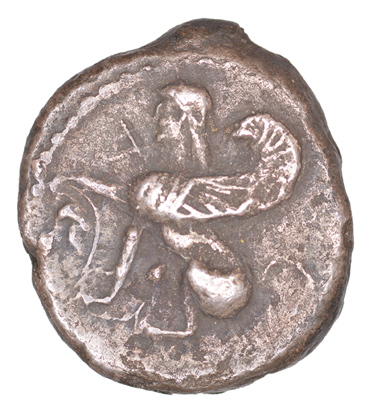 Obverse 'SilCoinCy A1060, acc.no.: KP 1443.3. Silver coin of king Stasikypros of Idalion 460 - 450/445 BC. Weight: 3.38 g, Axis: 10h, Diameter: 17mm. Obverse type: Sphinx seated l., raising r. foreleg on an inversed lotus flower.. Obverse symbol: -. Obverse legend: sa in -. Reverse type: Lotus  flower on two spiral tendrils; astragalos, r. ; ivy leaf l. within circular incuse. Reverse symbol: -. Reverse legend: - in -. '-'.
