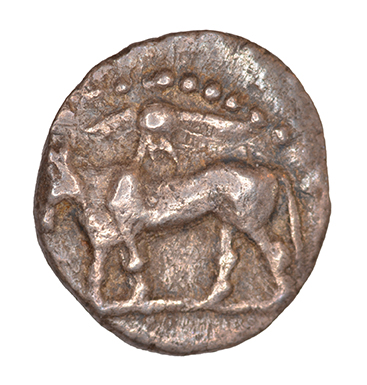 Obverse 'SilCoinCy A1067, acc.no.: KP 1610.11. Silver coin of king Stasandros of Paphos 460 - ?. Weight: 0.51 g, Axis: 10h, Diameter: 10mm. Obverse type: Bull standing l.; above winged solar disk. Obverse symbol: -. Obverse legend: - in -. Reverse type: Eagle standing l.; olive spray on the field r.. Reverse symbol: ankh. Reverse legend: pa-sa in Cypriot syllabic. '-', 'BMC Cyprus, A Catalogue of the Greek Coins in the British Museum, Cyprus'.
