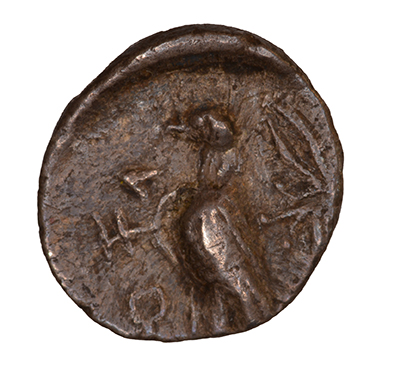 Reverse 'SilCoinCy A1067, acc.no.: KP 1610.11. Silver coin of king Stasandros of Paphos 460 - ?. Weight: 0.51 g, Axis: 10h, Diameter: 10mm. Obverse type: Bull standing l.; above winged solar disk. Obverse symbol: -. Obverse legend: - in -. Reverse type: Eagle standing l.; olive spray on the field r.. Reverse symbol: ankh. Reverse legend: pa-sa in Cypriot syllabic. '-', 'BMC Cyprus, A Catalogue of the Greek Coins in the British Museum, Cyprus'.