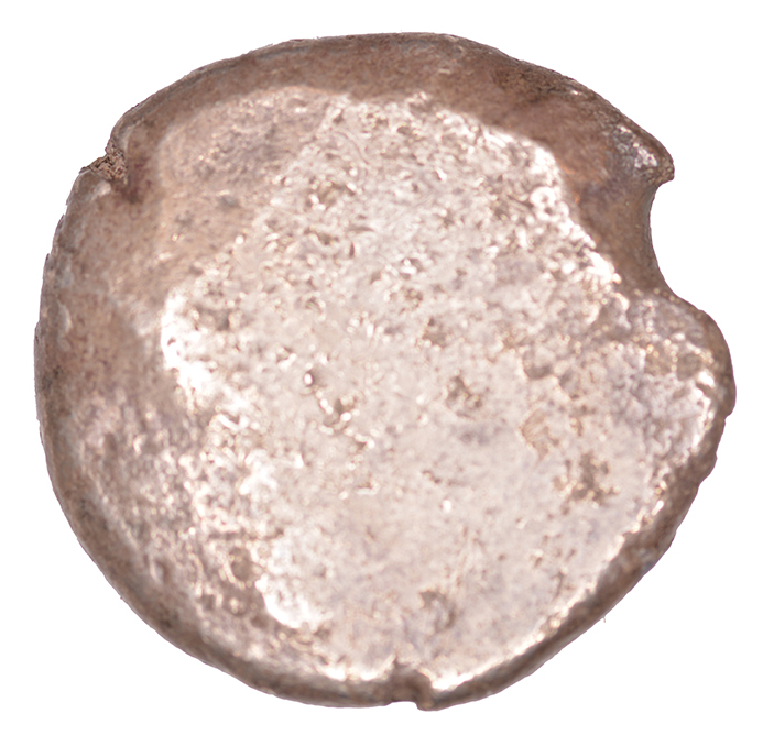 Οπισθότυπος 'SilCoinCy A1069, acc.no.: KP 477.24. Silver coin of king Evelthon of Salamis 525 - 500 BC. Weight: 0.95 g, Axis: -, Diameter: 20mm. Obverse type: Ram recumbent l.. Obverse symbol: -. Obverse legend: (e)-u-we-(le)-to-ne in Cypriot syllabic. Reverse type: Smooth. Reverse symbol: -. Reverse legend: - in -. '-', 'Du classement des séries chypriotes'.