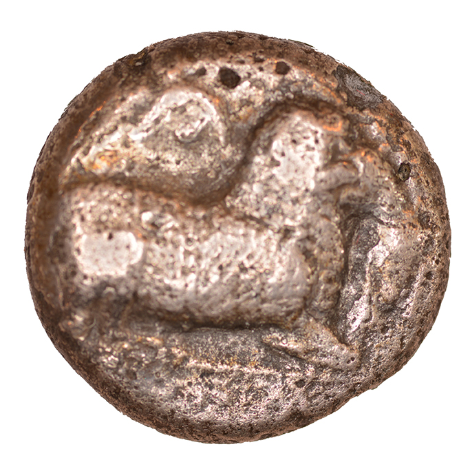 Obverse 'SilCoinCy A1073, acc.no.: KP 1260.20. Silver coin of king  of  . Weight: 0.16 g, Axis: 11h, Diameter: 20mm. Obverse type: Ram recumbent l. ; above, crescent and pellet; before, lion’s skin ?. Obverse symbol: crescent and pellet / lion’s skin. Obverse legend: obliterated in -. Reverse type: Ankh with cypriot syllabic sign in the circle. Reverse symbol: -. Reverse legend: pa in Cypriot syllabic. '-'.