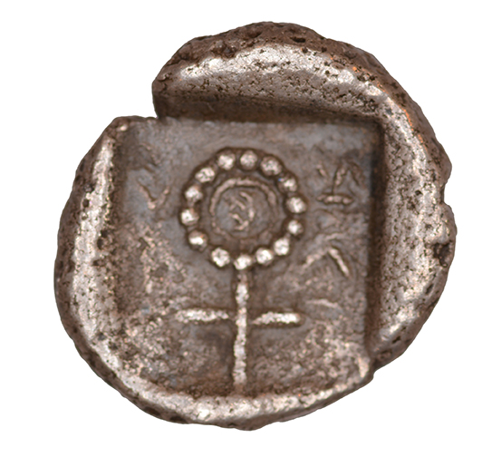 Reverse 'SilCoinCy A1075, acc.no.: KP 477.25. Silver coin of king Evelthon's successors of Salamis 500 - 478 BC. Weight: 2.70 g, Axis: 12h, Diameter: 14mm. Obverse type: Ram recumbent l.. Obverse symbol: -. Obverse legend: pa-si-le in Cypriot syllabic. Reverse type: Ankh with cypriot syllabic sign in the circle. Reverse symbol: -. Reverse legend: ni / la-ka-ri-ta in Cypriot syllabic. '-'.