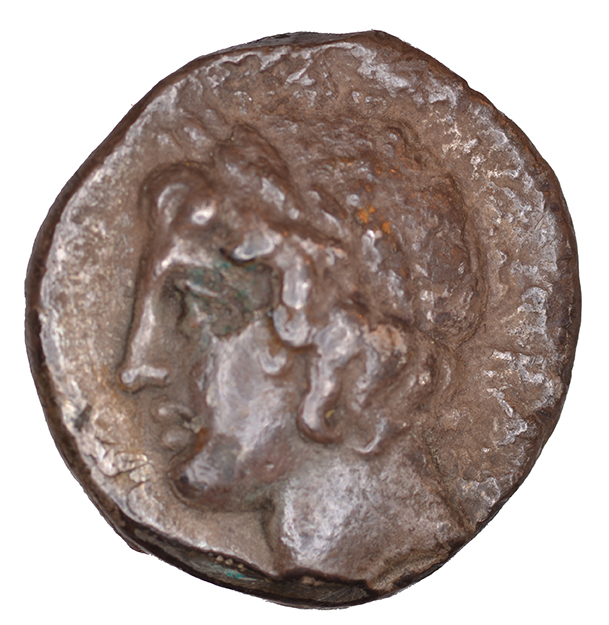 Reverse 'SilCoinCy A1100, acc.no.: KP 929.42. Silver coin of king  of  . Weight: 6.14 g, Axis: 12h, Diameter: 18mm. Obverse type: Aphrodite head r. with turreted crown. Obverse symbol: -. Obverse legend: NK in Greek. Reverse type: Apollo head l. with laurel wreath. Reverse symbol: -. Reverse legend: BA in Greek. '-'.
