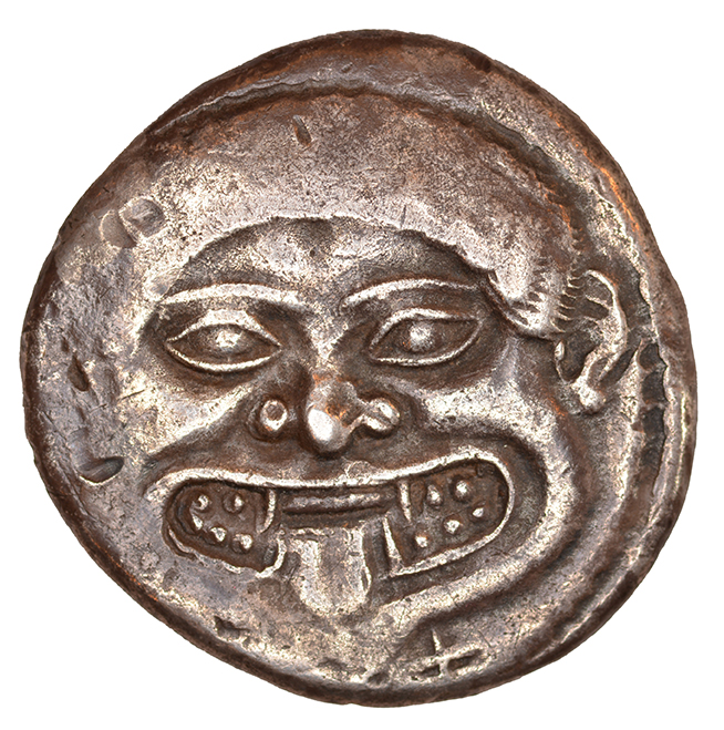 Obverse 'SilCoinCy A1101, acc.no.: KP 2119.1. Silver coin of king Uncertain king of Cyprus (archaic period) of Uncertain Cypriot mint  - . Weight: 0.88 g, Axis: 12h, Diameter: 22mm. Obverse type: Gorgoneion. Obverse symbol: -. Obverse legend: lo or pa in -. Reverse type: Ankh. Reverse symbol: -. Reverse legend: pa in Cypriot syllabic. '-'.