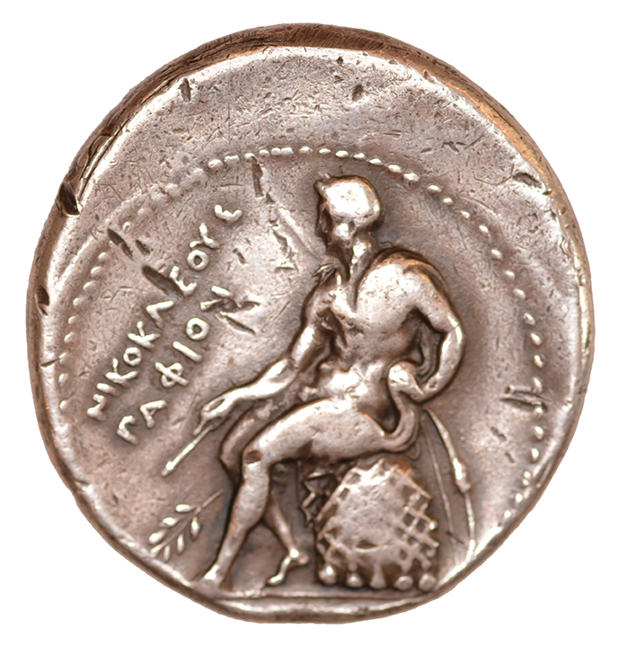 Οπισθότυπος 'SilCoinCy A1110, acc.no.: 628. Silver coin of king Nikokles (of Paphos) of Paphos 325 - 310 BC. Weight: 6.92 g, Axis: 12h, Diameter: 28mm. Obverse type: Aphrodite head l. with high crown decorated with towers. Obverse symbol: -. Obverse legend: ΠΒΑ in Greek. Reverse type: Apollo seated on the omphalos l. with bow and arrow. Reverse symbol: laurel branch. Reverse legend: ΝΙΚΟΚΛΕΟΥΣ ΠΑΦΙΟΝ in Greek. 'SNG Copenhague, supplement, Acquisitions 1942-1996', 'BMC Cyprus, A Catalogue of the Greek Coins in the British Museum, Cyprus', 'Notes de numismatique chypriote, appendix I. Bronzes du roi Timarchos', 'The Alexander coins of Nicocles of Paphos'.