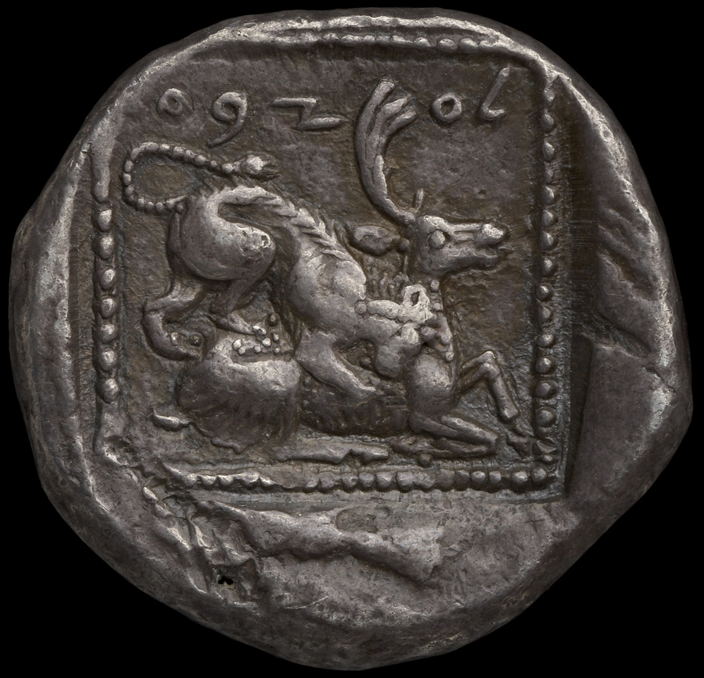 Οπισθότυπος 'SilCoinCy A1808, acc.no.: HCR 6322. Silver coin of king Ozibaal of Kition 450 - 425 BC. Weight: 10.77g, Axis: 12h, Diameter: 26mm. Obverse type: Heracles advancing r. holding club and bow. Obverse symbol: -. Obverse legend: - in -. Reverse type: Lion devouring stag r.. Reverse symbol: -. Reverse legend: l'zb' in Phoenician. 'BMC Cyprus, A Catalogue of the Greek Coins in the British Museum, Cyprus'.