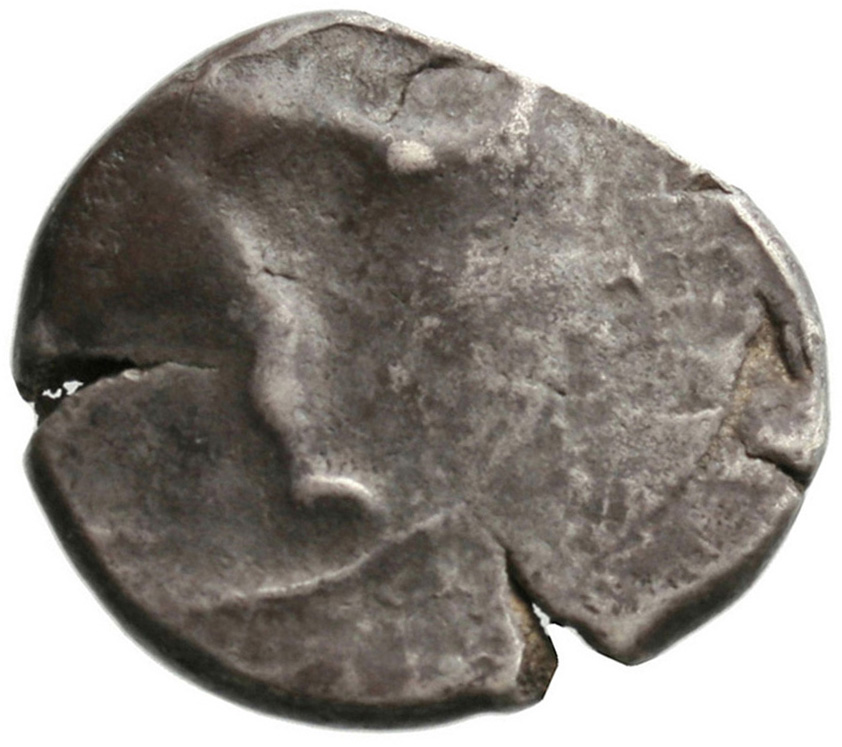 Obverse 'SilCoinCy A1809, acc.no.: . Silver coin of king Ozibaal of Kition 450 - 425 BC. Weight: 9.789g, Axis: 3h, Diameter: 24mm. Obverse type: Heracles advancing r. holding club and bow. Obverse symbol: -. Obverse legend: - in -. Reverse type: Lion devouring stag r.. Reverse symbol: -. Reverse legend: l'zb'l in Phoenician.