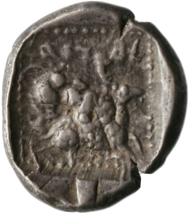 Οπισθότυπος 'SilCoinCy A1809, acc.no.: . Silver coin of king Ozibaal of Kition 450 - 425 BC. Weight: 9.789g, Axis: 3h, Diameter: 24mm. Obverse type: Heracles advancing r. holding club and bow. Obverse symbol: -. Obverse legend: - in -. Reverse type: Lion devouring stag r.. Reverse symbol: -. Reverse legend: l'zb'l in Phoenician.