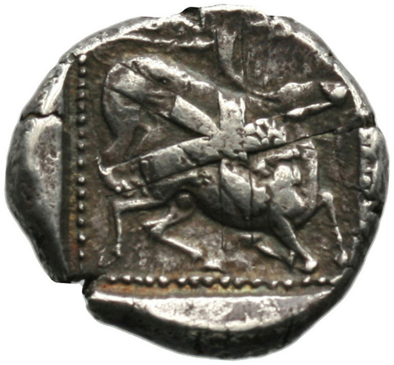 Οπισθότυπος 'SilCoinCy A1810, acc.no.: . Silver coin of king Ozibaal of Kition 450 - 425 BC. Weight: 11.02g, Axis: 4h, Diameter: 22mm. Obverse type: Heracles advancing r. holding club and bow. Obverse symbol: -. Obverse legend: - in -. Reverse type: Lion devouring stag r.. Reverse symbol: -. Reverse legend: - in -.