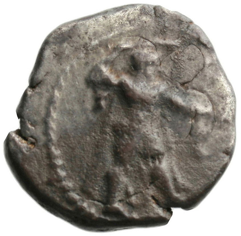 Obverse 'SilCoinCy A1811, acc.no.: . Silver coin of king Ozibaal of Kition 450 - 425 BC. Weight: 10.93g, Axis: 3h, Diameter: 24mm. Obverse type: Heracles advancing r. holding club and bow. Obverse symbol: -. Obverse legend: - in -. Reverse type: Lion devouring stag r.. Reverse symbol: -. Reverse legend: - in -.