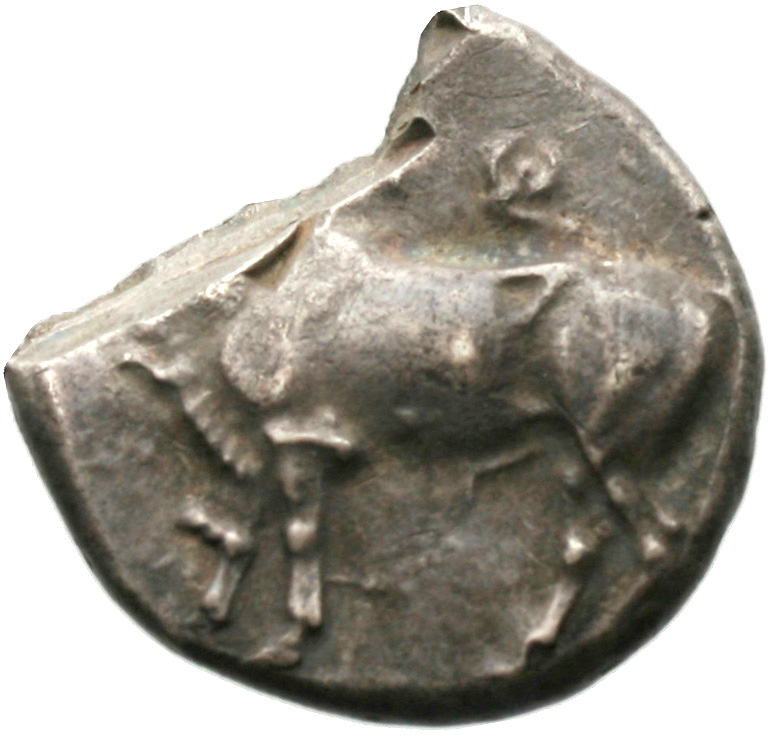Obverse 'SilCoinCy A1932, acc.no.: . Silver coin of king Onasi(-) of Paphos . Weight: 8.47g, Axis: 1h, Diameter: 22mm. Obverse type: Bull standing l.. Obverse symbol: -. Obverse legend: - in -. Reverse type: Eagle’s head l. in incuse square; below, guilloche pattern. Reverse symbol: -. Reverse legend: - in -.