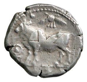 Obverse 'SilCoinCy A5001, acc.no.: 7581. Silver coin of king Stasandros of Paphos 460 - ?. Weight: 11.01g, Axis: 6h, Diameter: 22mm. Obverse type: Ταύρος βαδίζει (α). Obverse symbol: -. Obverse legend: - in -. Reverse type: Αετός ιστάμενος (α) με κλειστά φτερά. Reverse symbol: -. Reverse legend: pa-si / sa-ta in Cypriot syllabic.