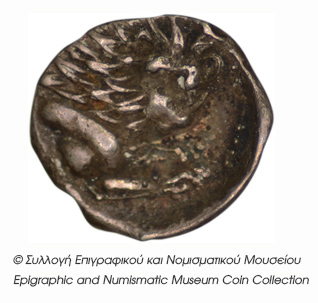 Reverse 'SilCoinCy B2, Kyrou Collection, acc.no.: ΒΠ 1989 - 2. Silver coin of king Wroikos of Amathous 350 ? BC - . Weight: 0.5g, Axis: 12h, Diameter: 10mm. Obverse type: Lion head r.. Obverse symbol: -. Obverse legend: - in -. Reverse type: Forepart of a lion r.. Reverse symbol: -. Reverse legend: - in -. 'Les monnaies chypriotes dans la collection d'Adonis Kyrou'.